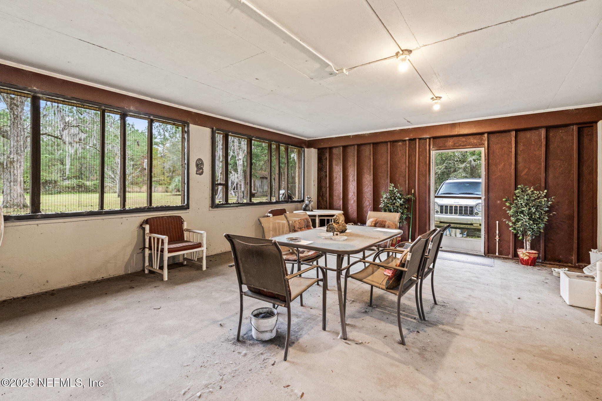 5705 CR 208 St. Augustine, FL 32092 - Photo 33 of 86 a view of a dining room with furniture window and outside view