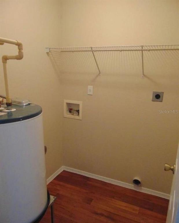 5816 Congress Street, Unit 102 New Port Richey, FL 34653 - Photo 14 of 14 a view of a room with racks on the wall