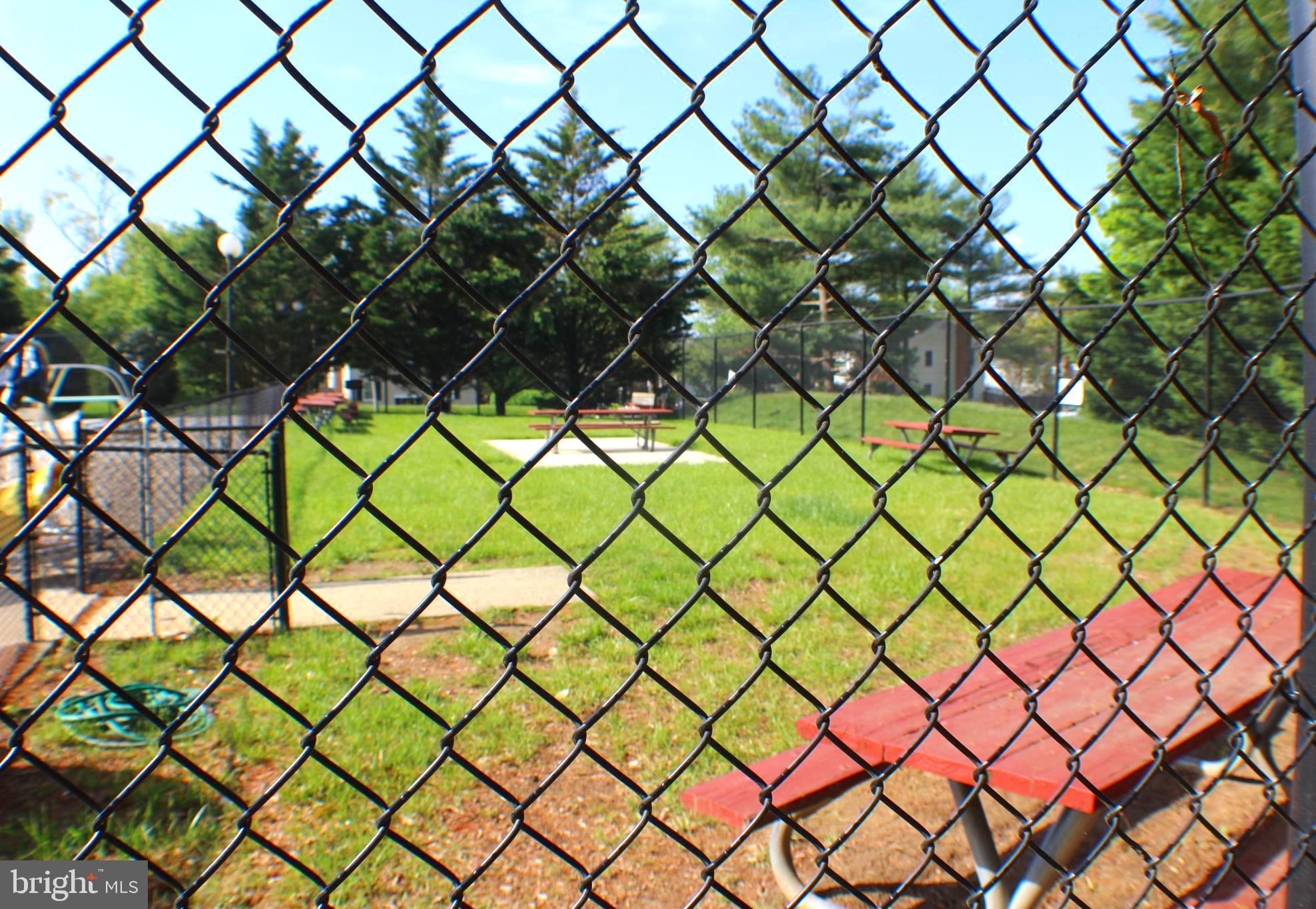 7739 Matisse Way Springfield, VA 22153 - Photo 65 of 65 Picnic Area with Grills and Tables