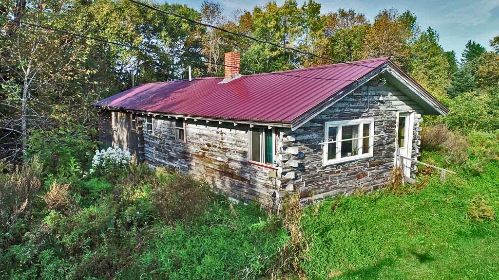 1719 Ludlow Road Houlton, ME 04730 - Photo 36 of 47 ludlow-log-home-drone-1