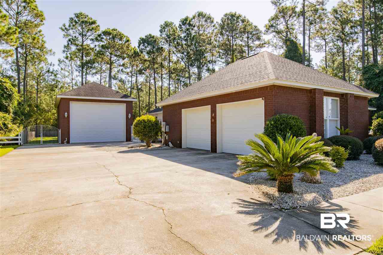 9110 Bay Point Drive Elberta, AL 36530 - Photo 5 of 50 2 car attached garage has 10x6 heated/cooled room.