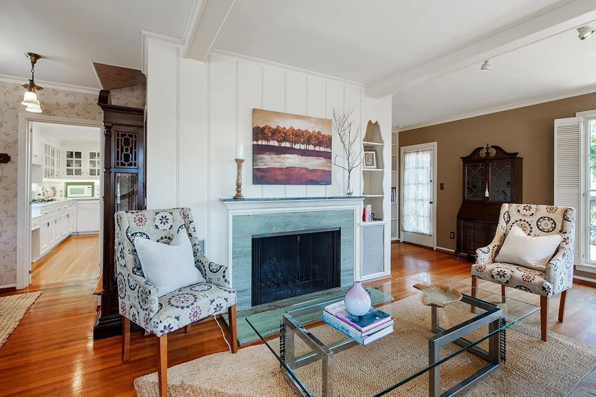 305 West Olive Street San Diego, CA 92103 - Photo 12 of 74 a living room with furniture and a fireplace