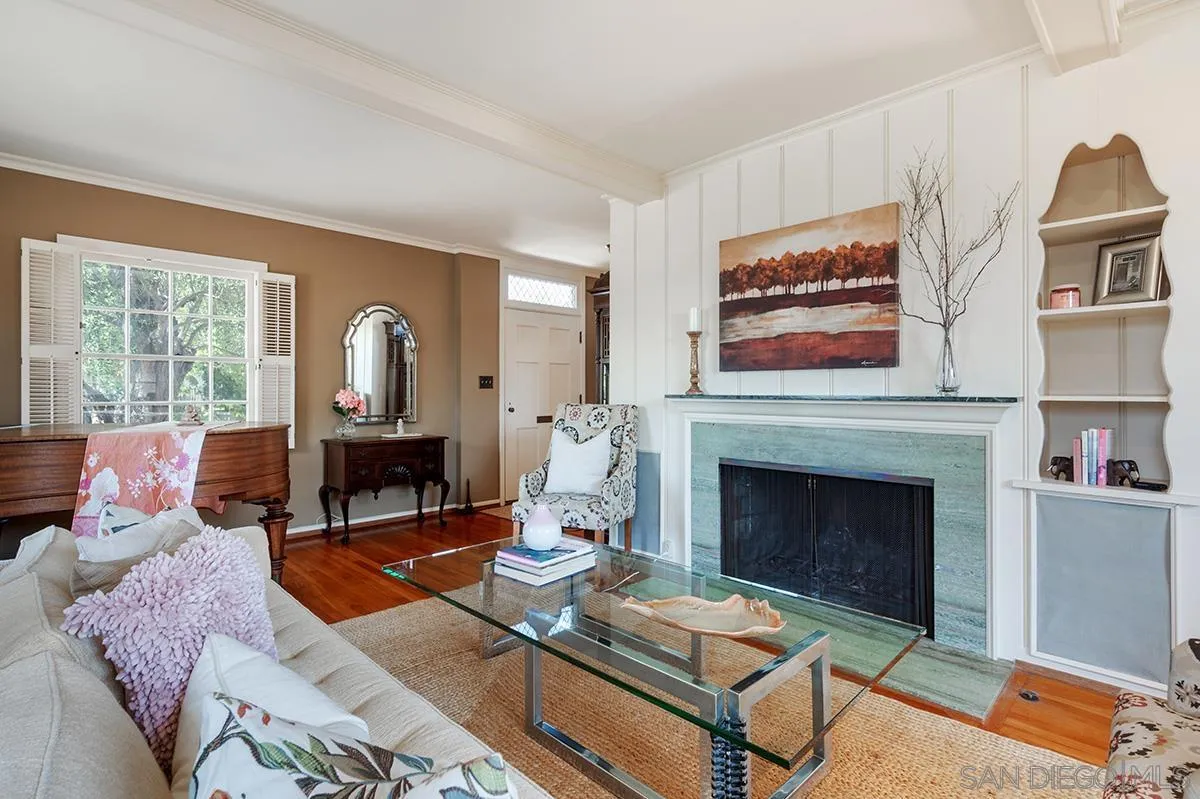 305 West Olive Street San Diego, CA 92103 - Photo 14 of 74 a living room with furniture a fireplace and next to a window