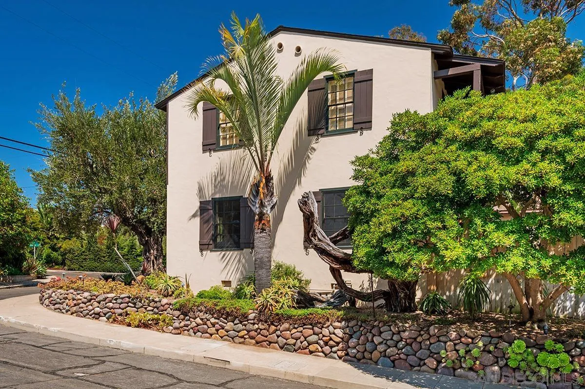 305 West Olive Street San Diego, CA 92103 - Photo 3 of 74 a front view of a house with garden