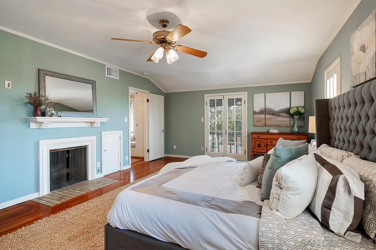 305 West Olive Street San Diego, CA 92103 - Photo 41 of 74 a bedroom with a bed and flat screen tv