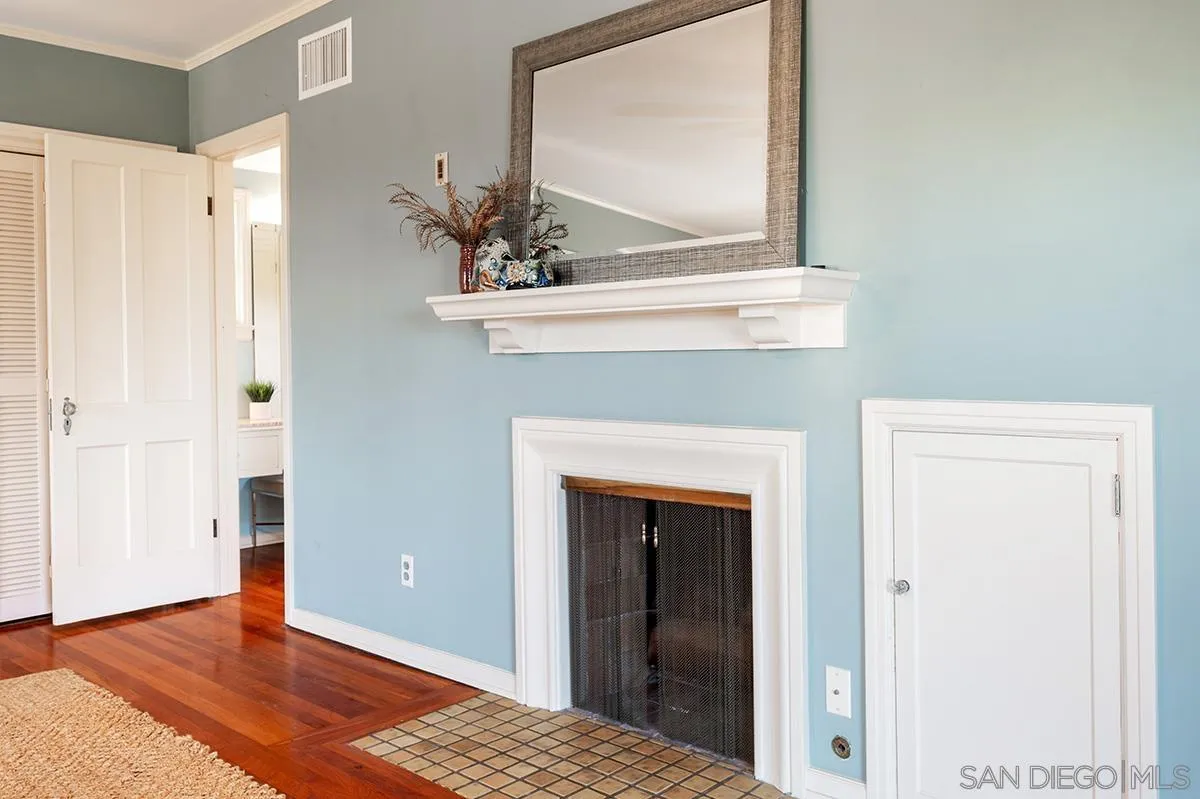 305 West Olive Street San Diego, CA 92103 - Photo 44 of 74 a view of a hallway with wooden floor and staircase
