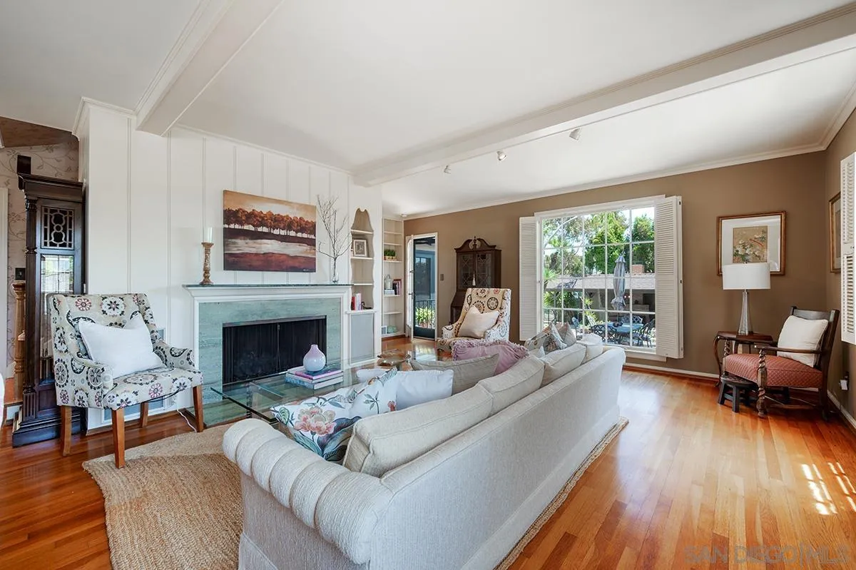 305 West Olive Street San Diego, CA 92103 - Photo 8 of 74 a living room with furniture and a fireplace