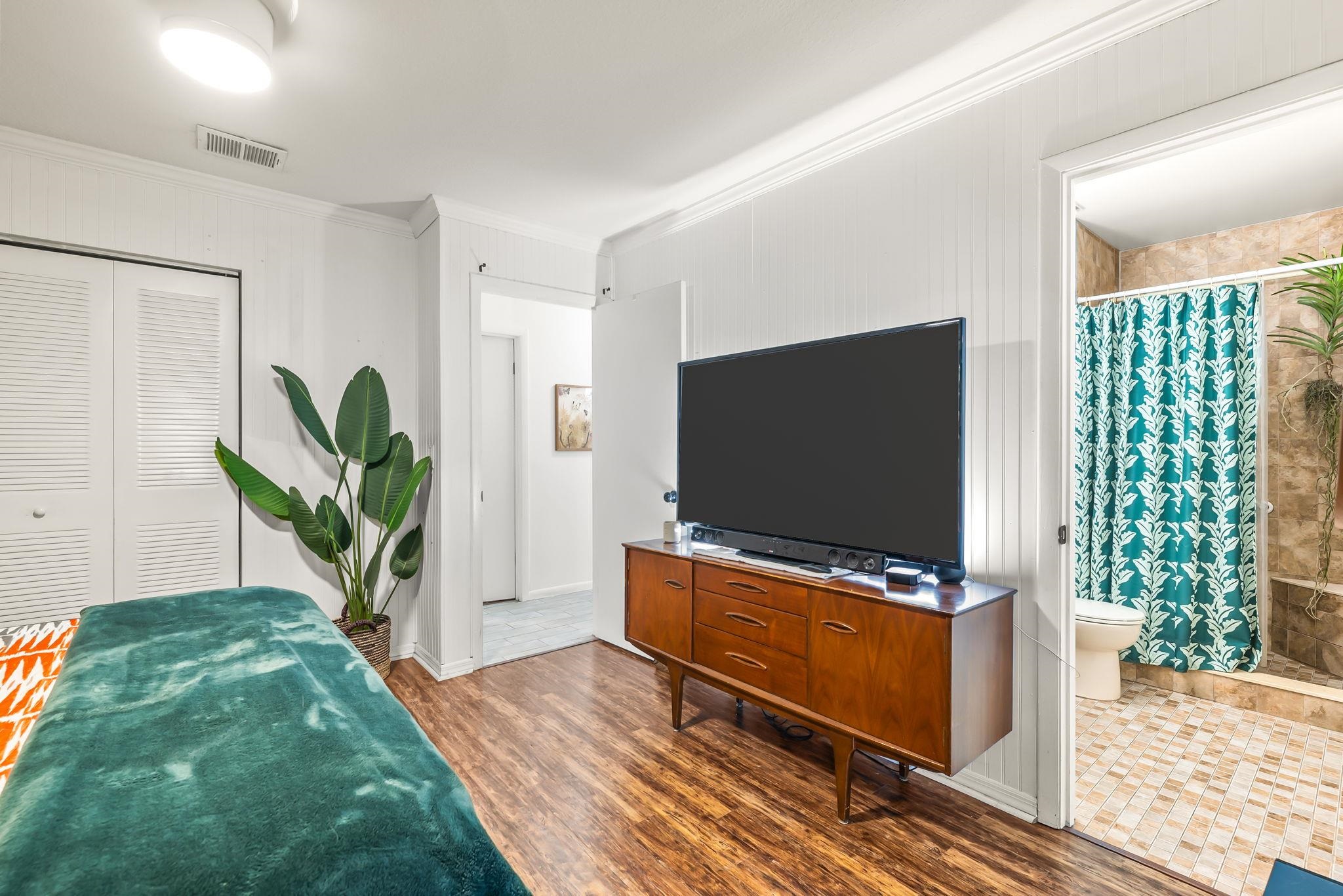 129 Pelican Road St. Augustine, FL 32086 - Photo 4 of 34 Living room featuring dark wood-style flooring and crown molding