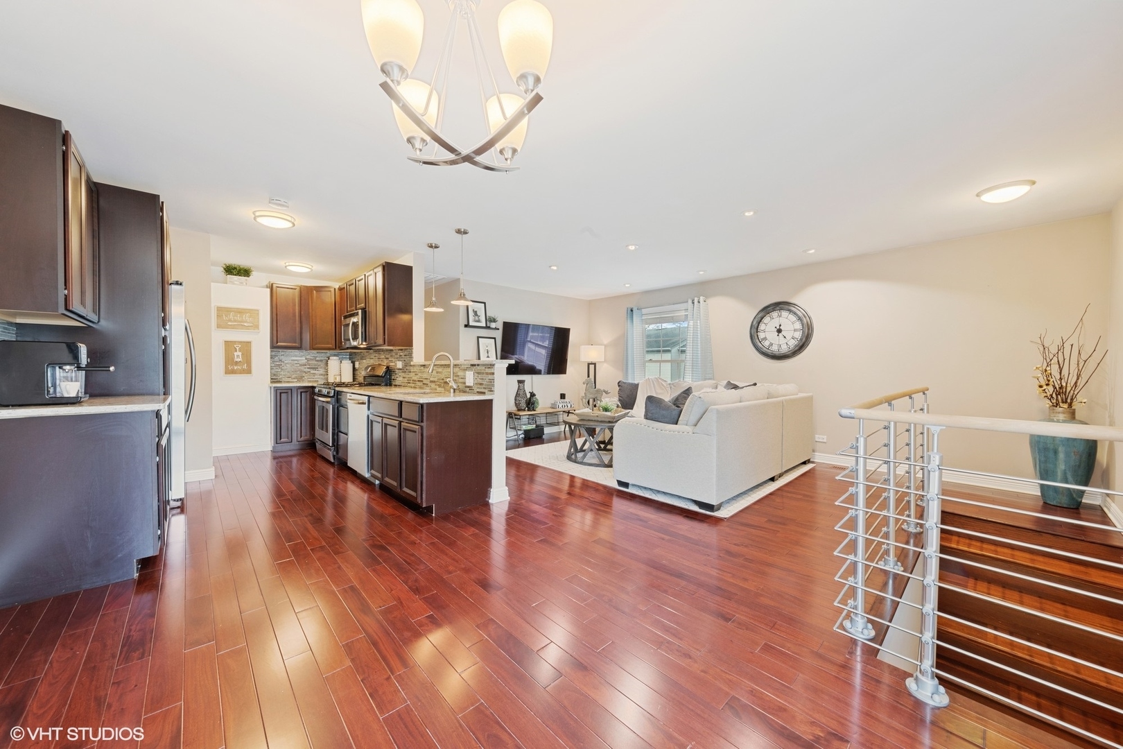 1675 Valley Forge Court, Unit A Wheaton, IL 60189 - Photo 7 of 11 a living room with furniture and kitchen view