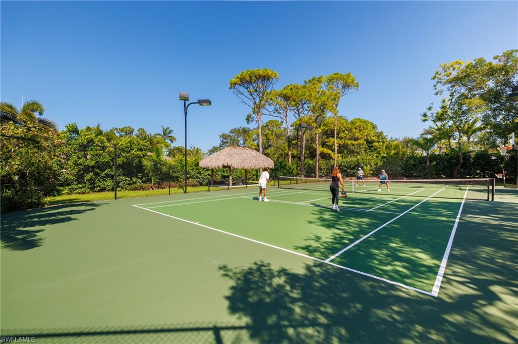 111 Caribbean Road Naples, FL 34108 - Photo 7 of 50 a view of a basketball court