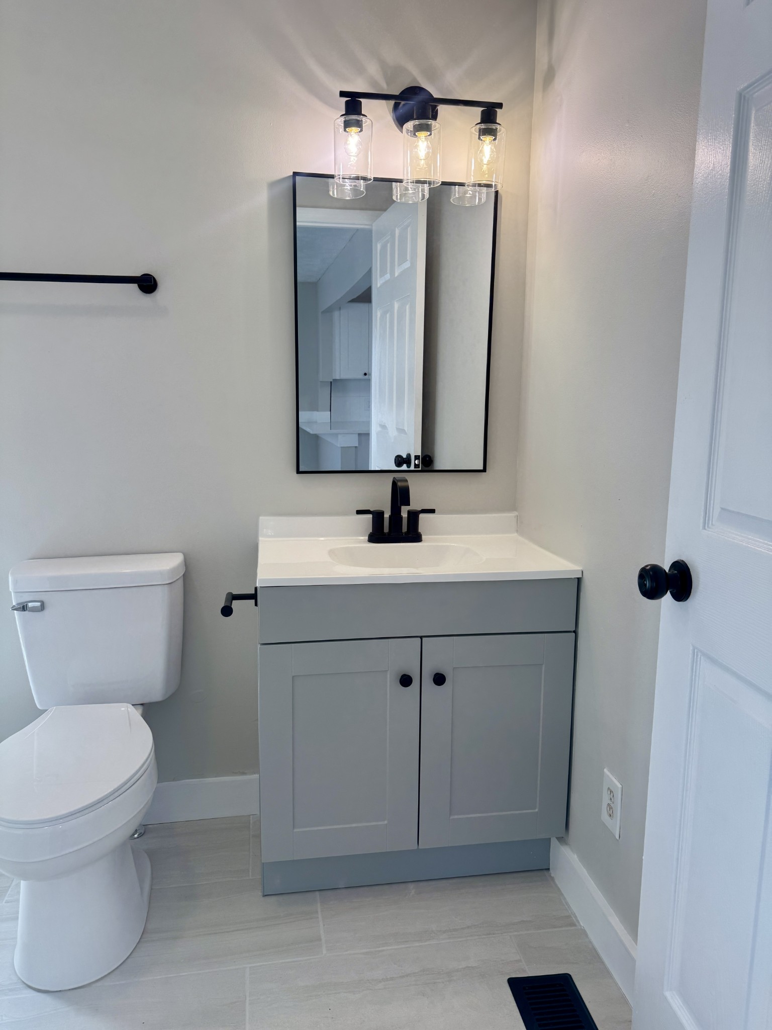 3163 Sunset Drive Springfield, TN 37172 - Photo 19 of 39 a bathroom with a sink vanity and toilet