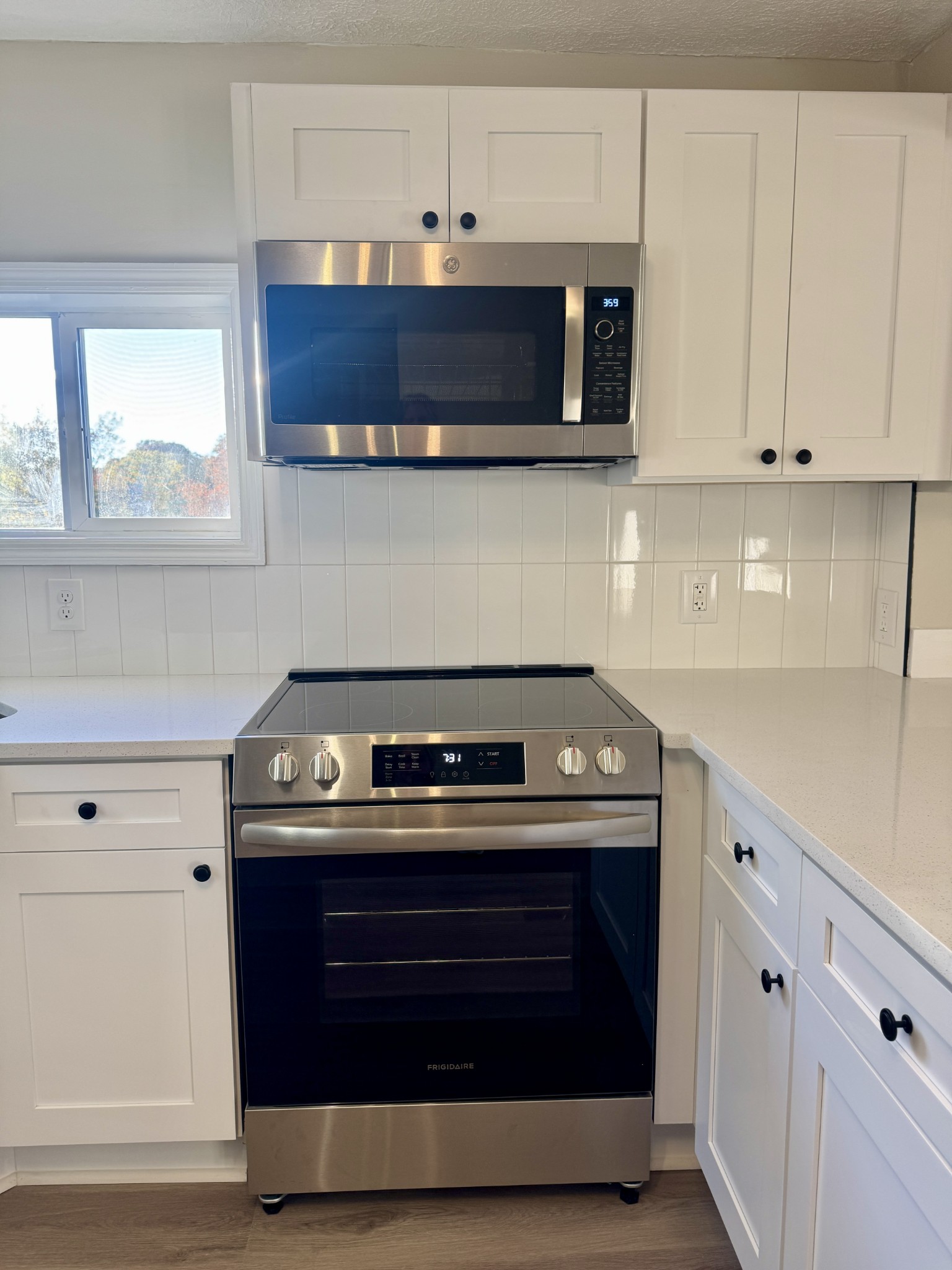 3163 Sunset Drive Springfield, TN 37172 - Photo 25 of 39 a stove top oven sitting inside of a kitchen