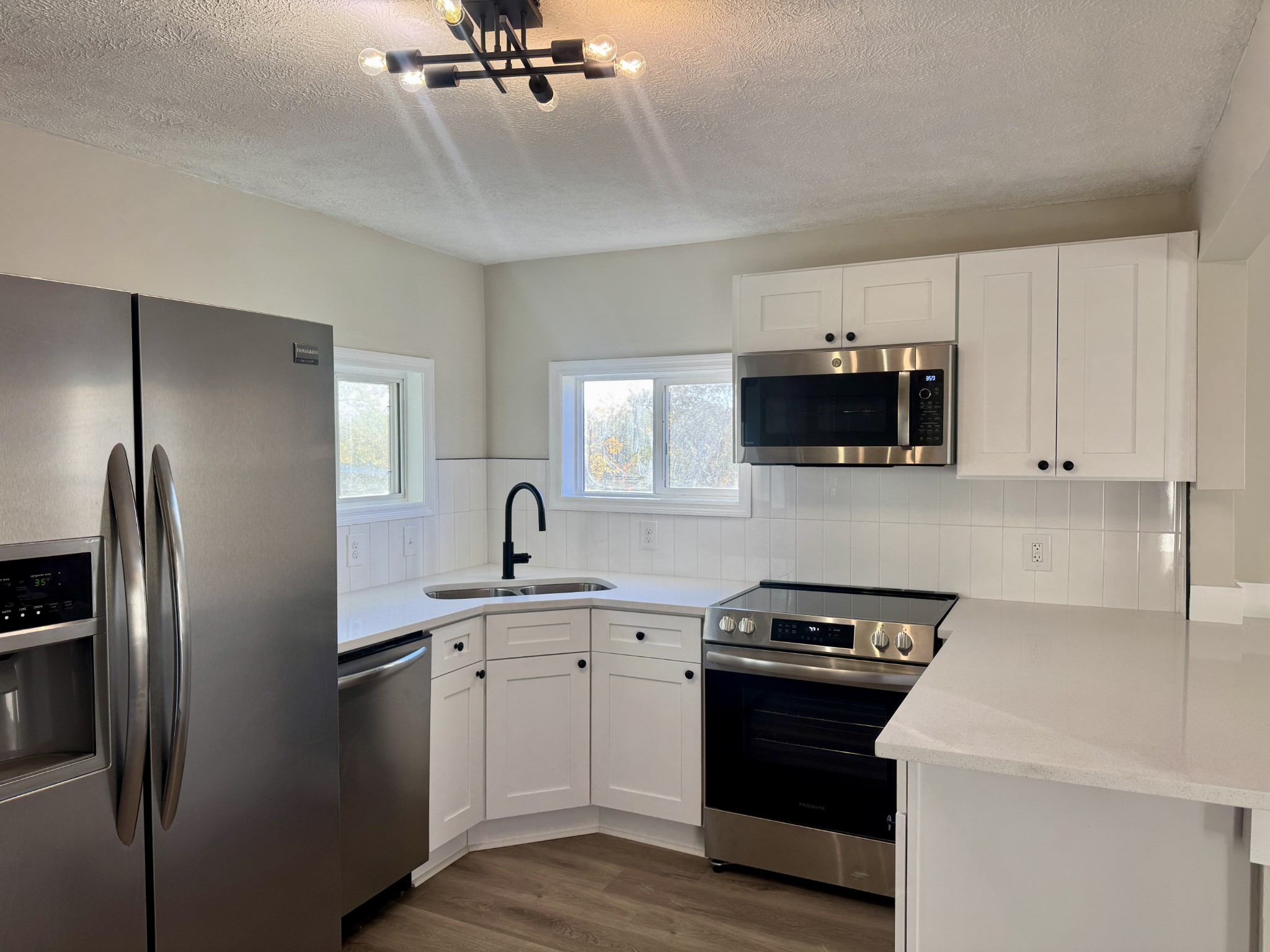 3163 Sunset Drive Springfield, TN 37172 - Photo 26 of 39 a kitchen with a sink appliances and cabinets