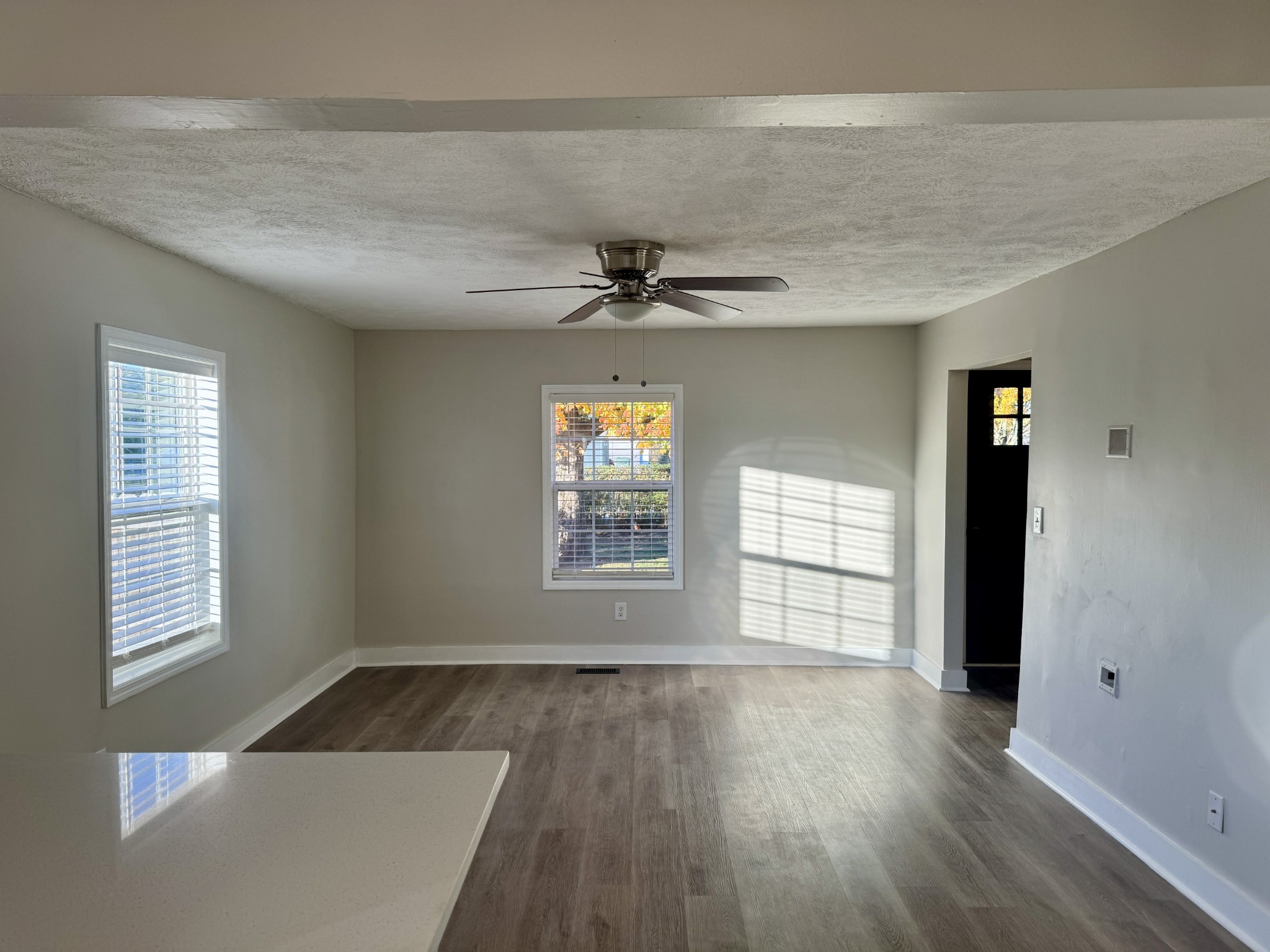 3163 Sunset Drive Springfield, TN 37172 - Photo 29 of 39 an empty room with wooden floor and windows