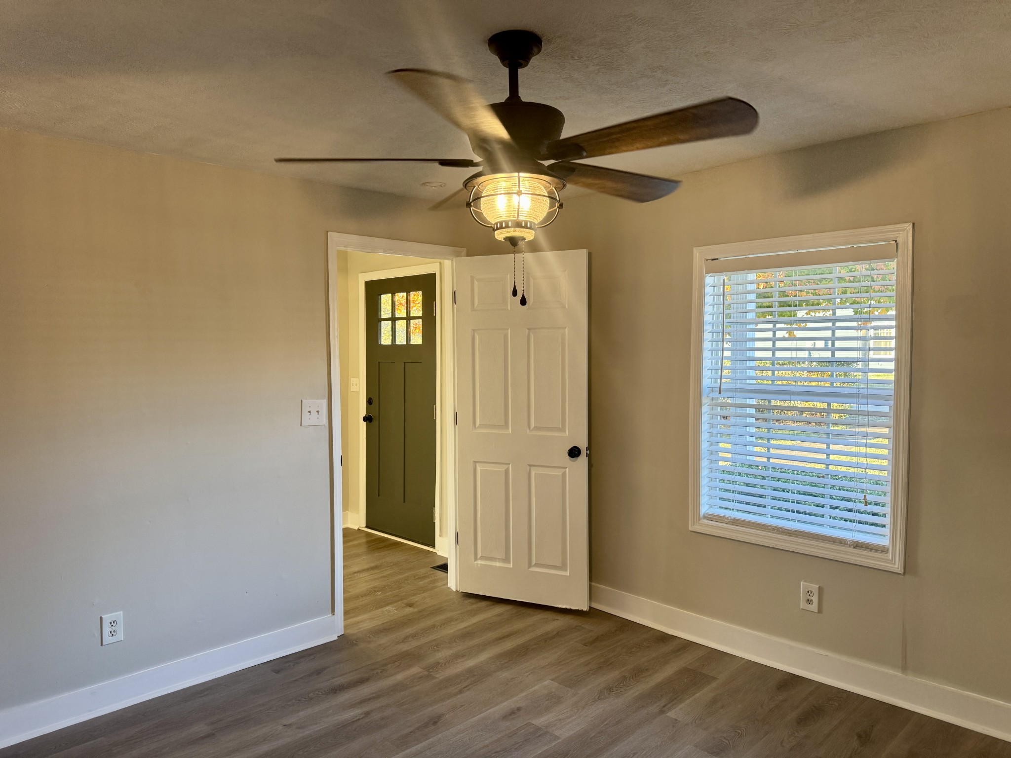 3163 Sunset Drive Springfield, TN 37172 - Photo 33 of 39 a view of an empty room with wooden floor and a window