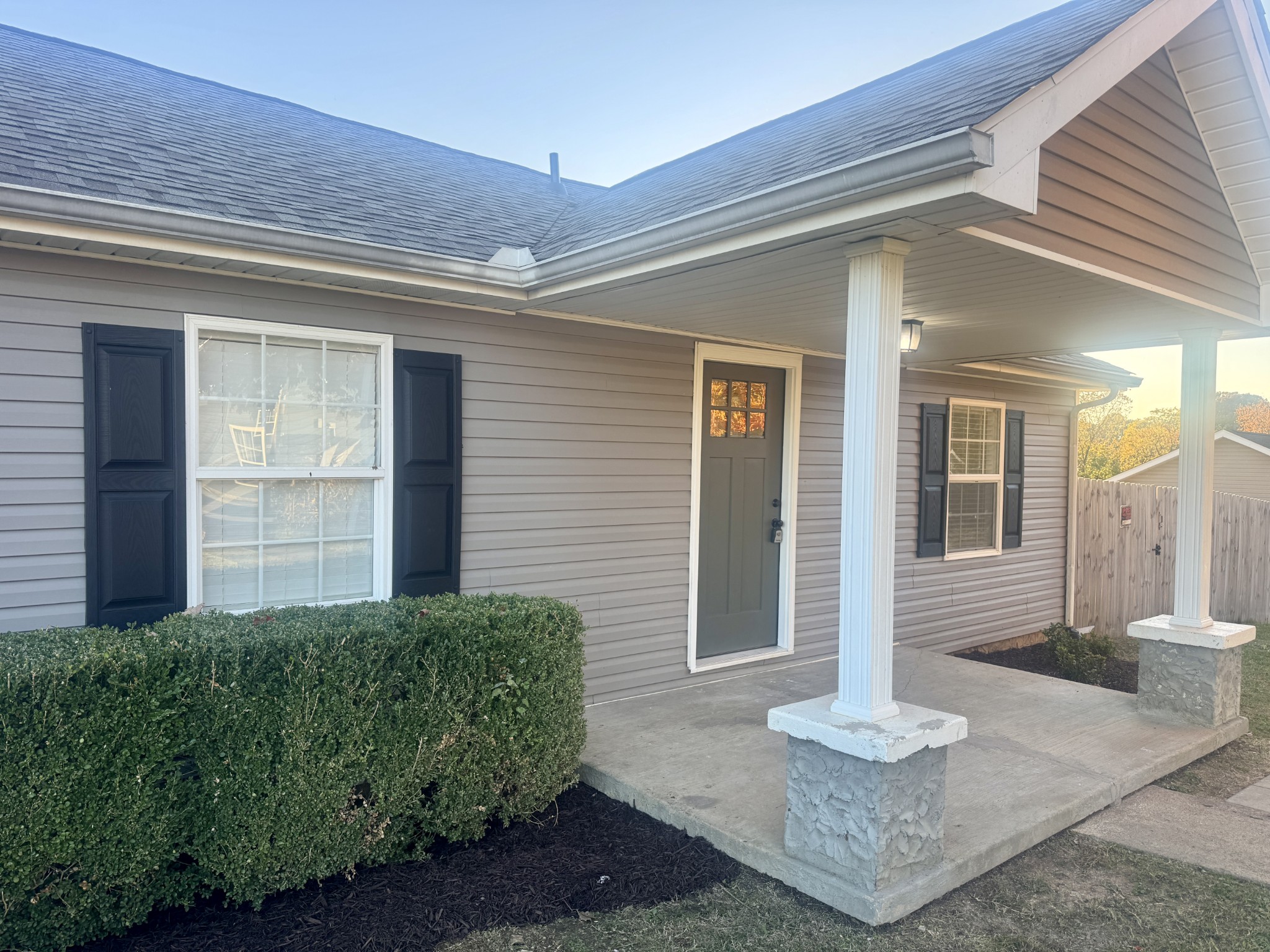 3163 Sunset Drive Springfield, TN 37172 - Photo 36 of 39 a view of a house with small yard plants and wooden fence
