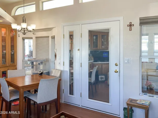 a kitchen with stainless steel appliances a stove a sink a microwave and cabinets