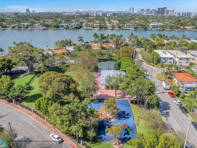 a balcony with table and chairs