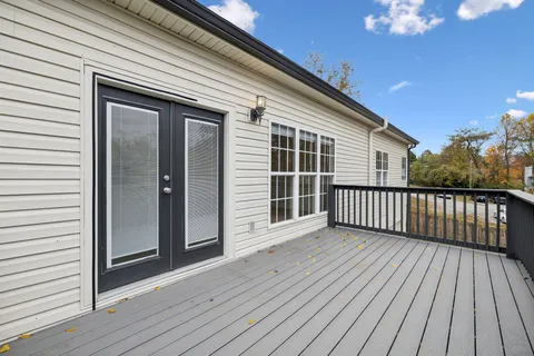 a backyard of a house with lots of green space