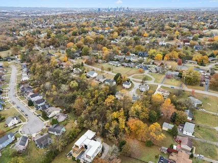 an aerial view of residential building with parking space