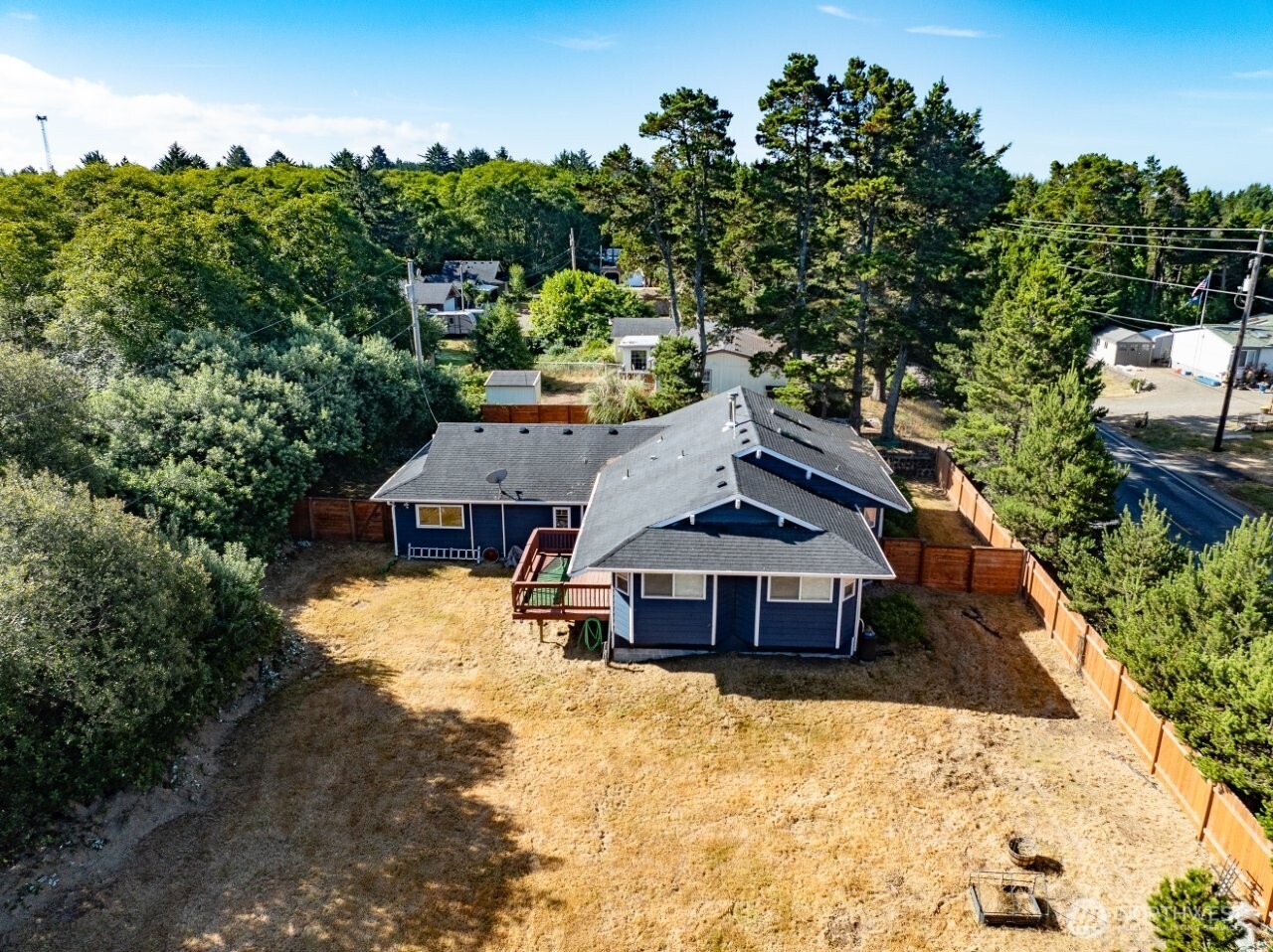 13208 Pacific Way Long Beach, WA 98631 - Photo 2 of 40 a view of a house with a yard