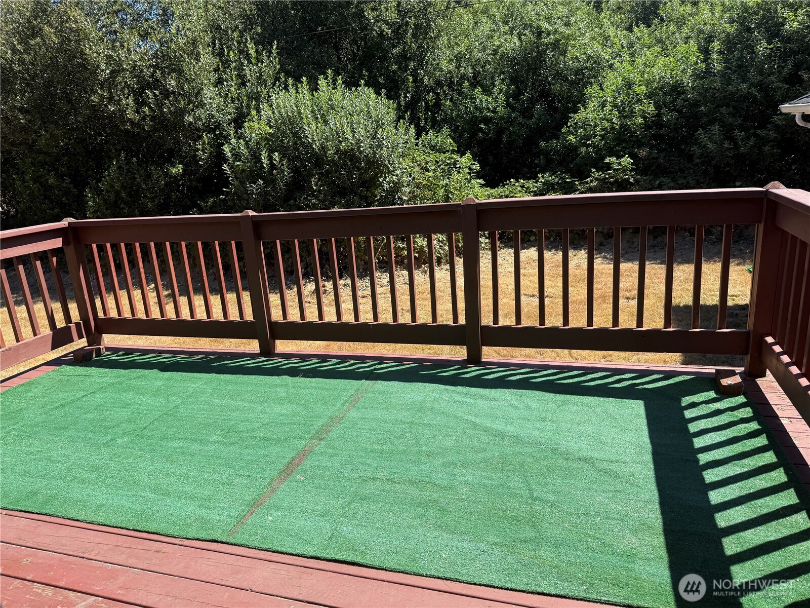 13208 Pacific Way Long Beach, WA 98631 - Photo 38 of 40 a view of a backyard with wooden floor