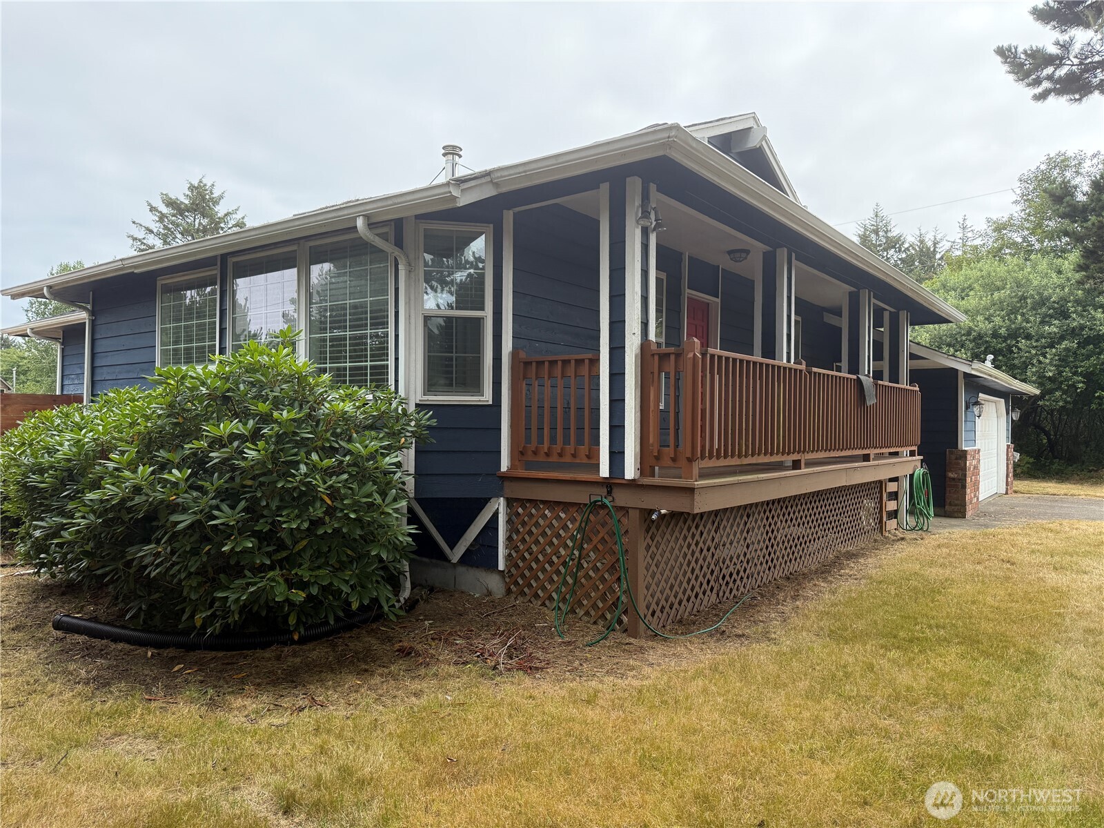 13208 Pacific Way Long Beach, WA 98631 - Photo 5 of 40 a view of a house with a yard