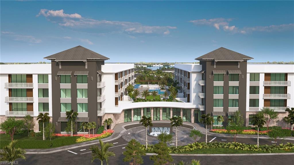 4936 Tamiami Trail East, Unit 319 Naples, FL 34113 - Photo 6 of 10 front view of a house with a yard