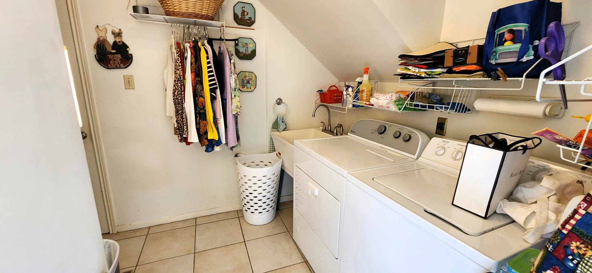 16155 Hexham Drive Spring, TX 77379 - Photo 22 of 47 a utility room with dryer and washer
