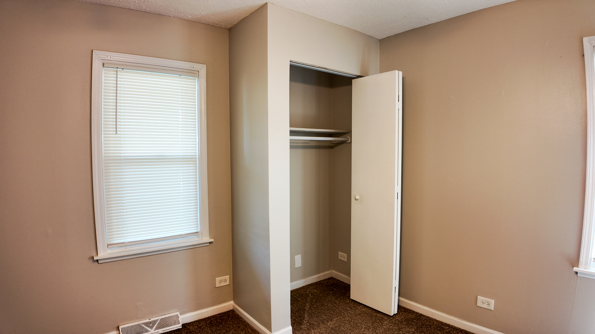 11604 South Kenneth Avenue Alsip, IL 60803 - Photo 16 of 26 a view of an empty room with closet and a window