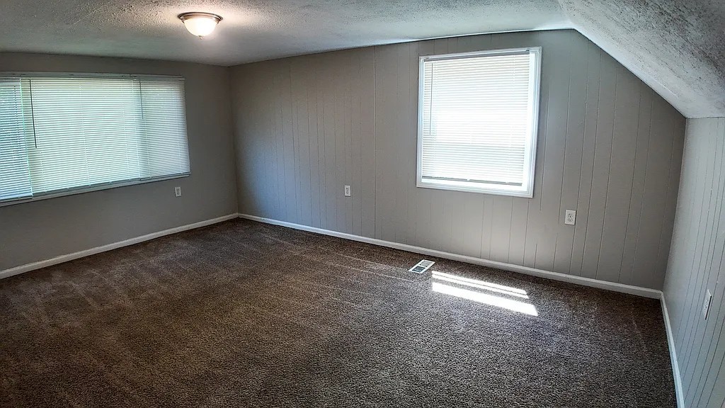 11604 South Kenneth Avenue Alsip, IL 60803 - Photo 9 of 26 an empty room with a window