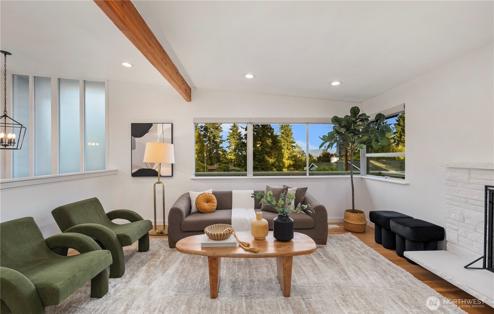 201 165th Avenue Northeast Bellevue, WA 98008 - Photo 3 of 13 a living room with furniture and a large window