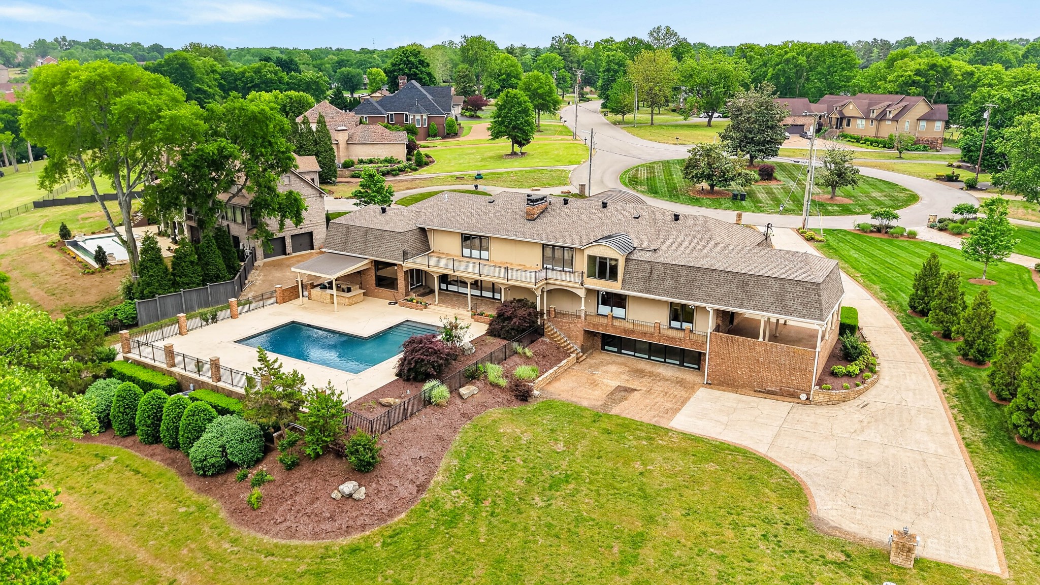 101 Kennett Road Old Hickory, TN 37138 - Photo 10 of 100 an aerial view of a house with yard swimming pool and outdoor seating