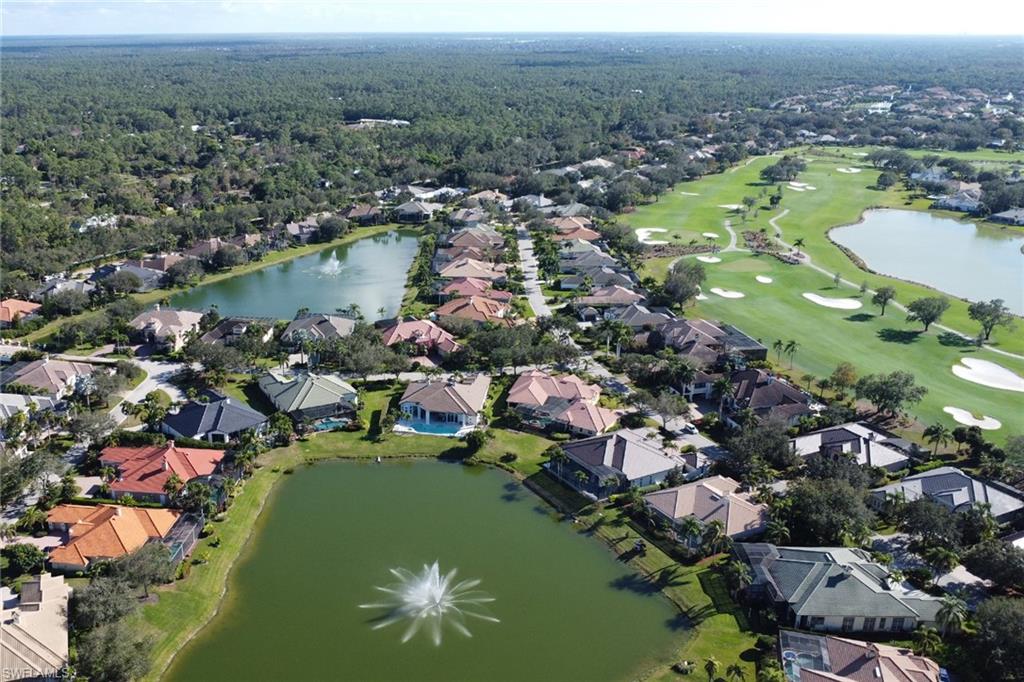 435 Terracina Way Naples, FL 34119 - Photo 44 of 50 an aerial view of lake residential houses with outdoor space and lake view