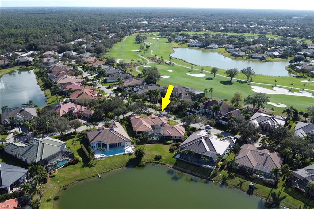 435 Terracina Way Naples, FL 34119 - Photo 45 of 50 an aerial view of residential house with outdoor space and lake view