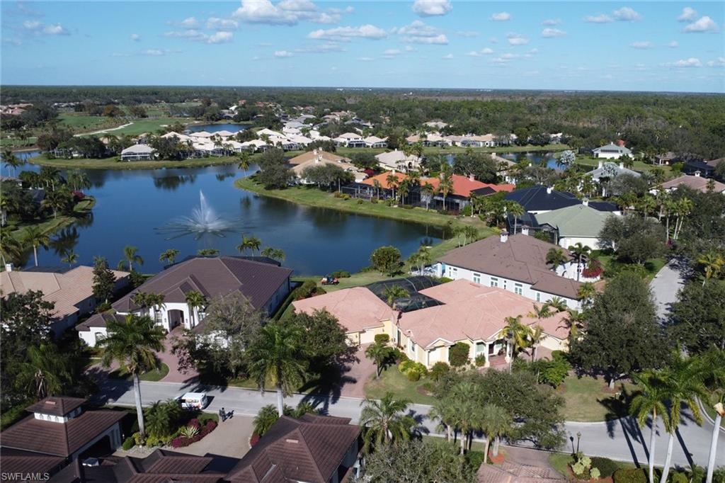 435 Terracina Way Naples, FL 34119 - Photo 46 of 50 an aerial view of residential houses with outdoor space and lake view