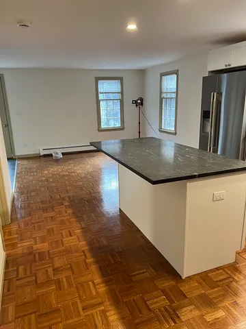a view of a kitchen with a sink
