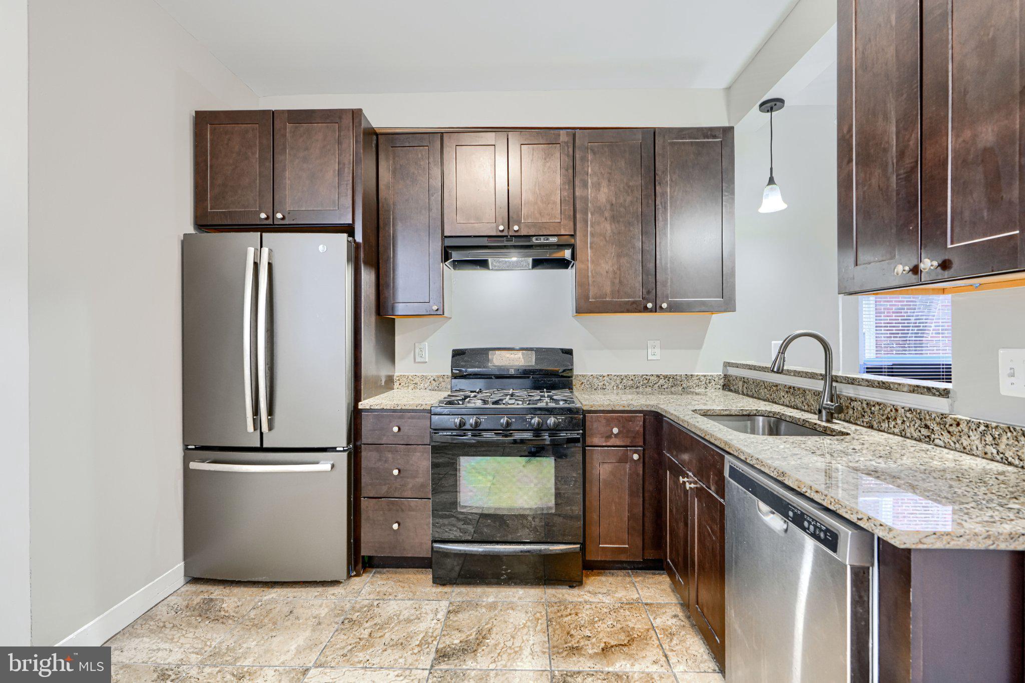 3414 Alto Road, Unit 1 Baltimore, MD 21216 - Photo 12 of 18 Modern kitchen with sleek finishes.