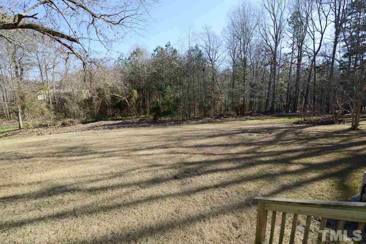 8300 Pinecrest Road Raleigh, NC 27613 - Photo 12 of 12 a view of a backyard of the house