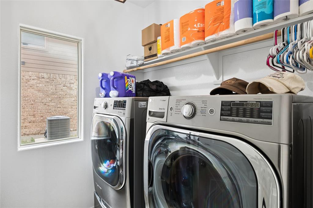 324 Fairgrounds Lane Ponder, TX 76259 - Photo 22 of 40 a utility room with dryer and washer