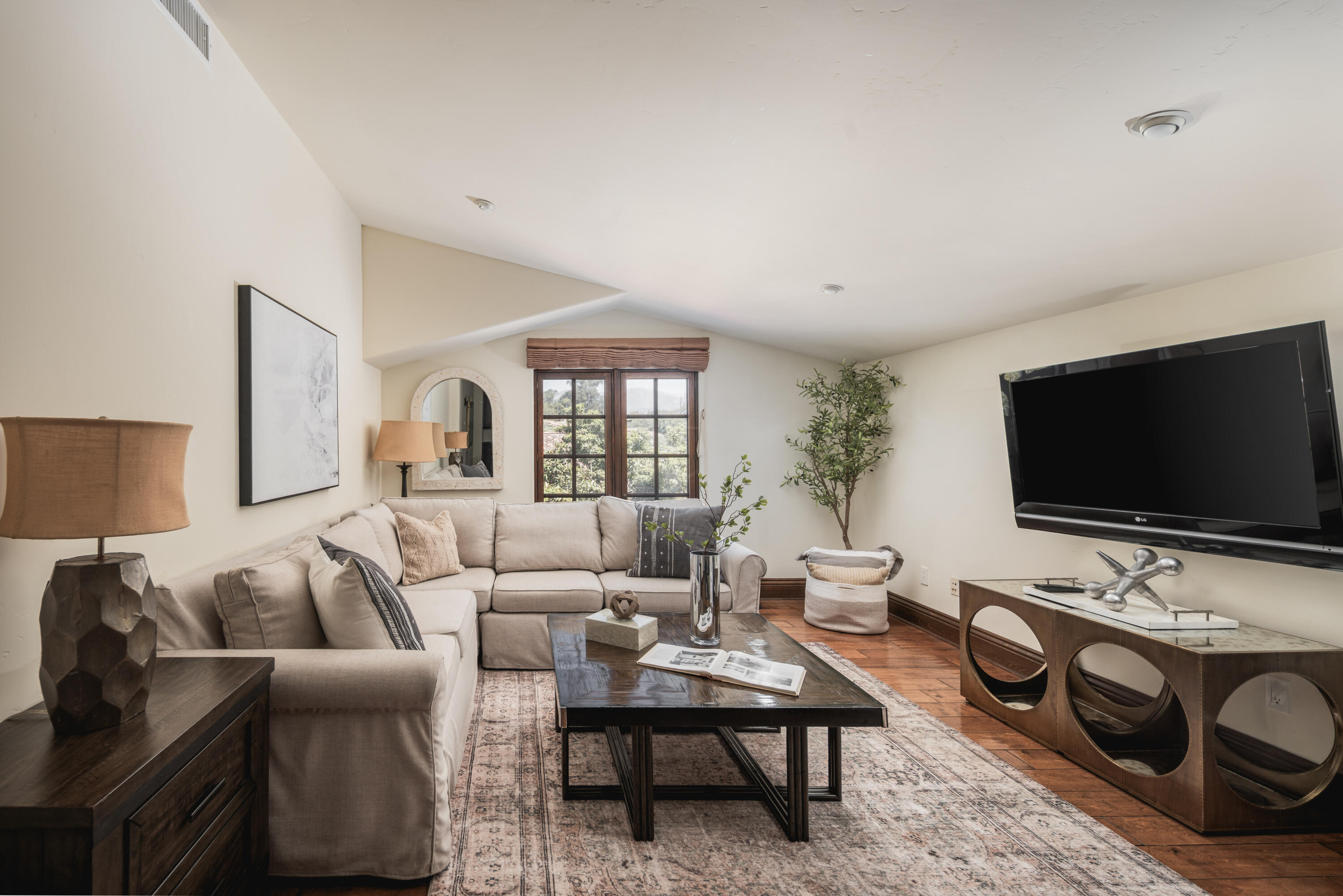267 Elderberry Drive Goleta, CA 93117 - Photo 15 of 28 a living room with furniture and a flat screen tv