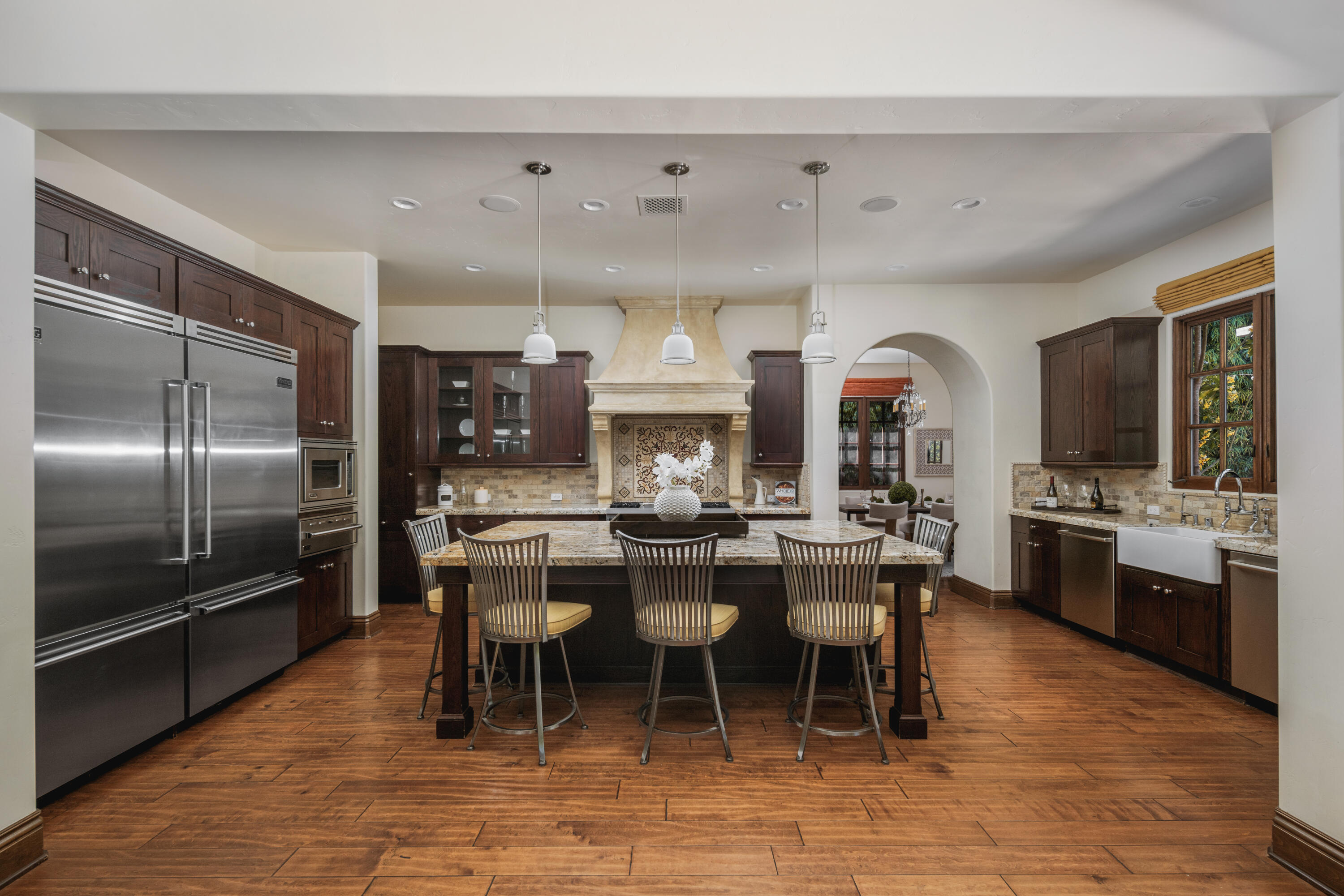 267 Elderberry Drive Goleta, CA 93117 - Photo 10 of 28 a dining area with stainless steel appliances kitchen island granite countertop a dining table and chairs