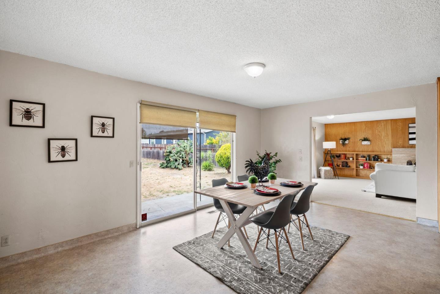 345 Green Valley Road Watsonville, CA 95076 - Photo 14 of 44 a dining room with furniture and a floor to ceiling window