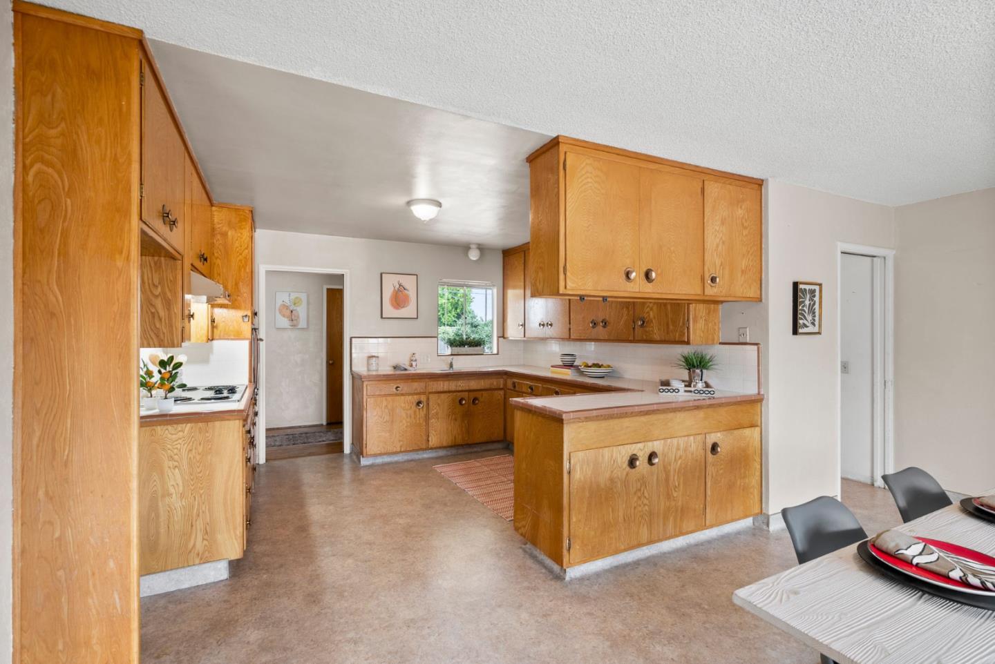 345 Green Valley Road Watsonville, CA 95076 - Photo 16 of 44 a kitchen with stainless steel appliances granite countertop a stove a sink and a refrigerator