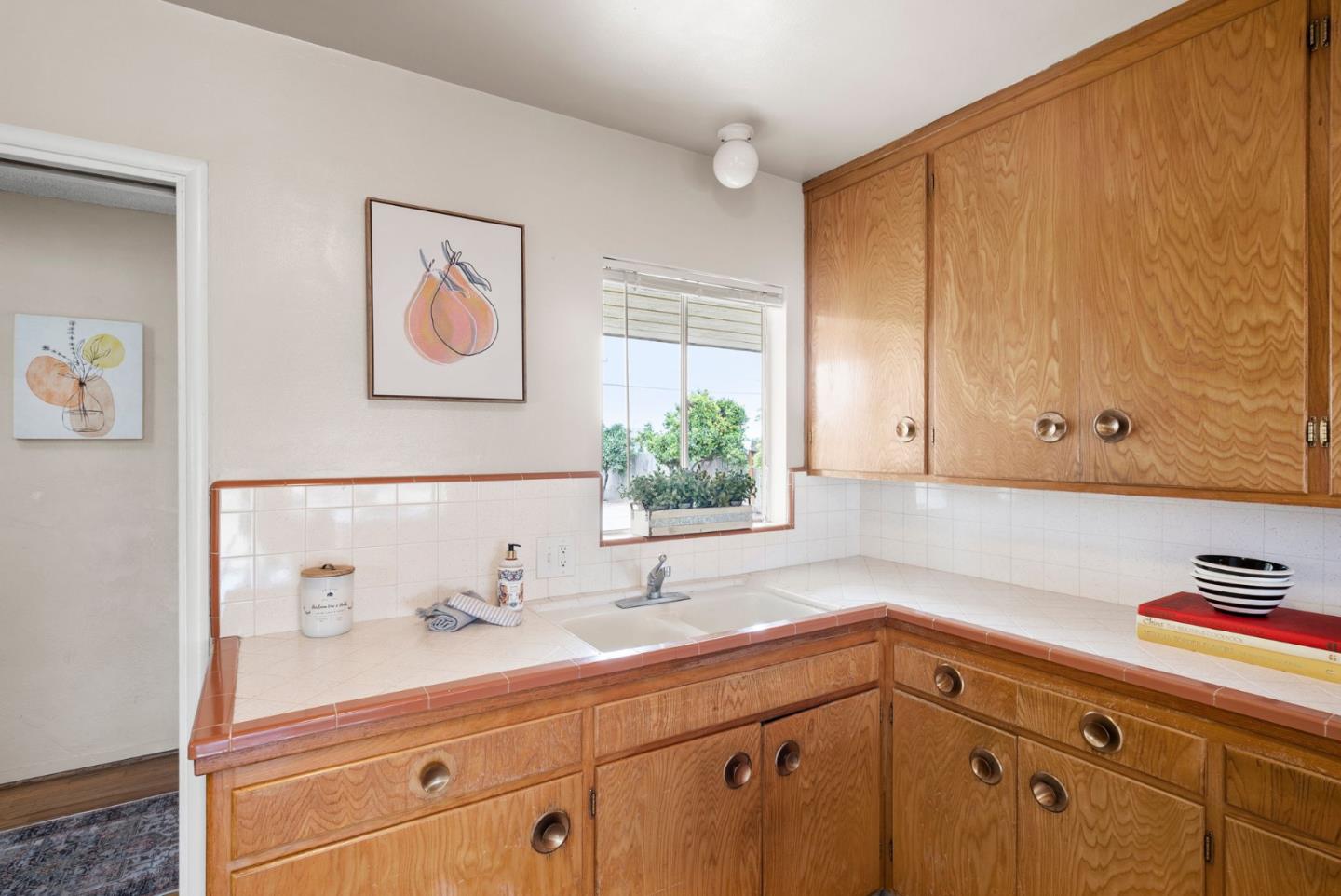 345 Green Valley Road Watsonville, CA 95076 - Photo 18 of 44 a kitchen with a sink and cabinets