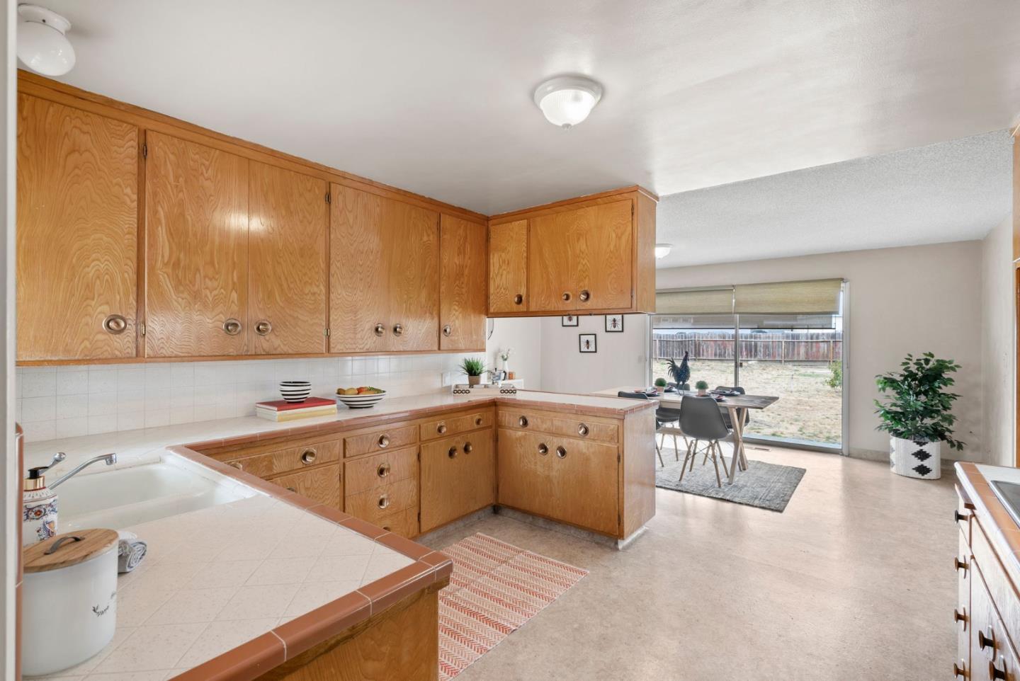 345 Green Valley Road Watsonville, CA 95076 - Photo 19 of 44 a kitchen with a sink and cabinets