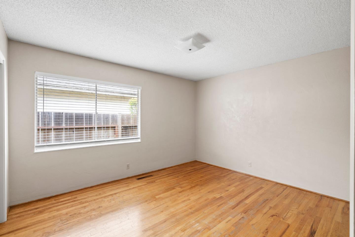 345 Green Valley Road Watsonville, CA 95076 - Photo 25 of 44 an empty room with a window