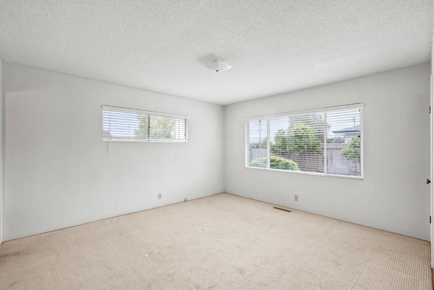 345 Green Valley Road Watsonville, CA 95076 - Photo 27 of 44 an empty room with windows