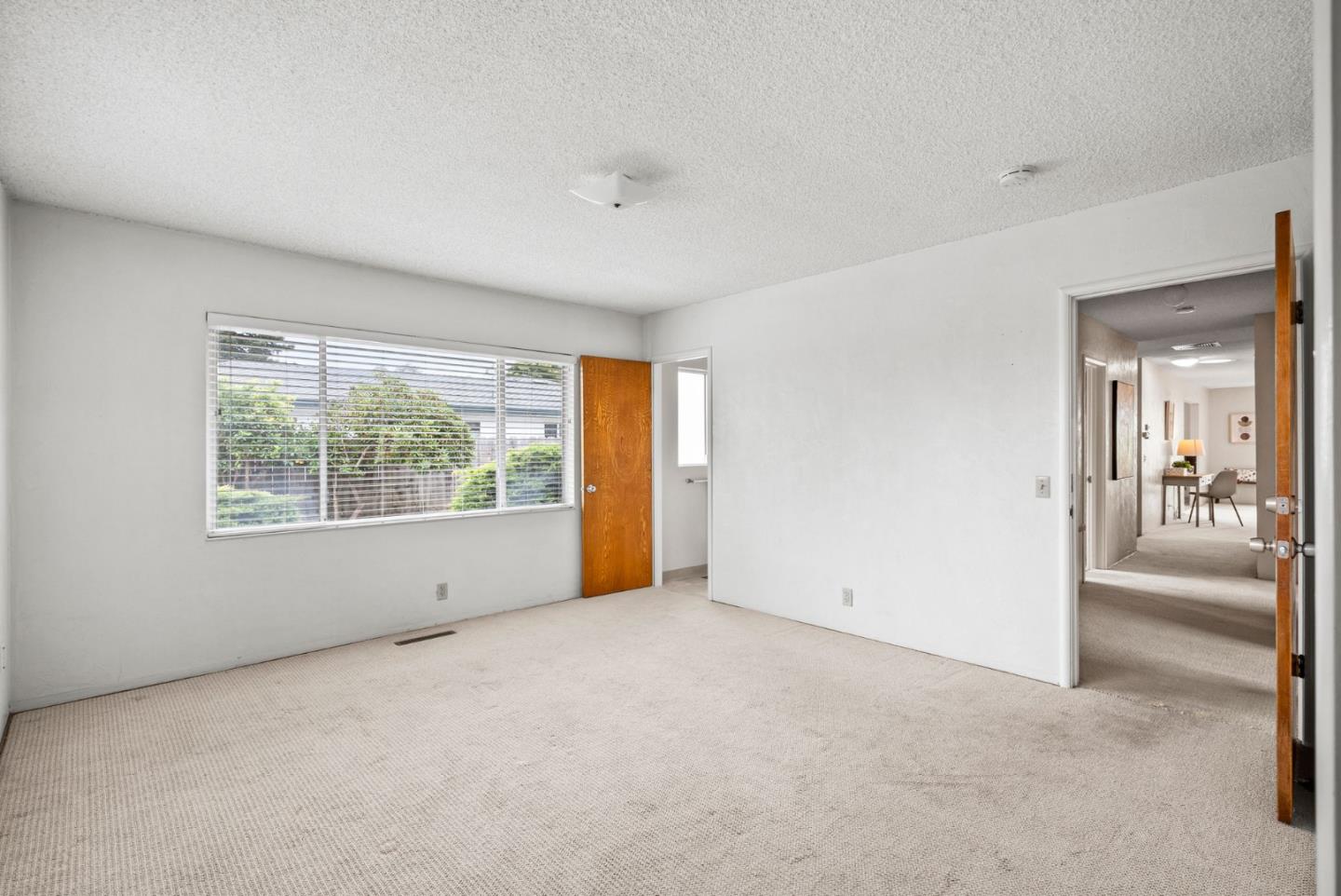 345 Green Valley Road Watsonville, CA 95076 - Photo 29 of 44 a view of an empty room with a window