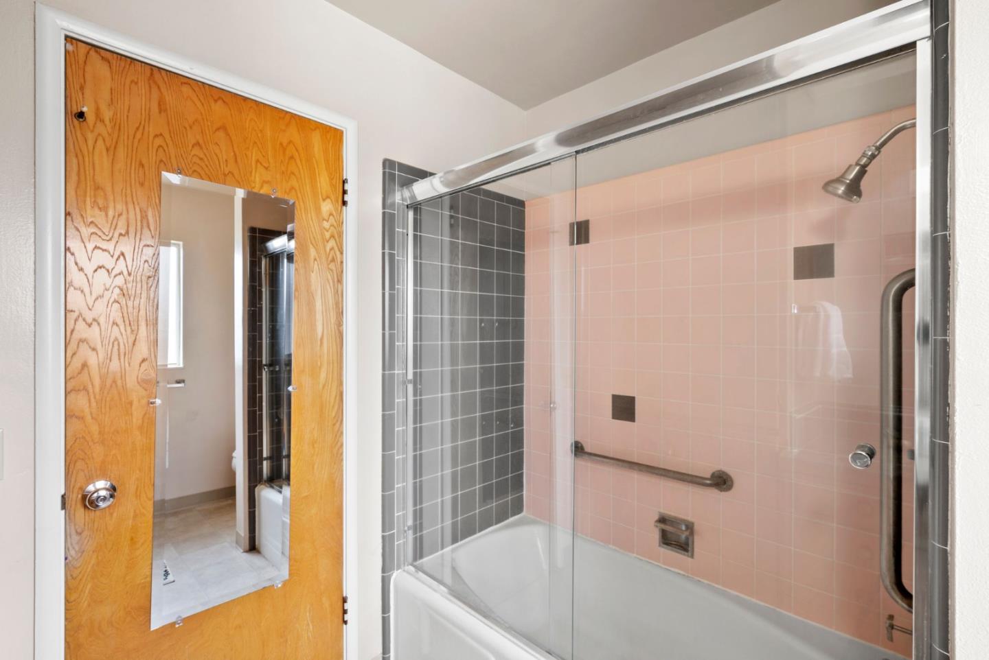 345 Green Valley Road Watsonville, CA 95076 - Photo 37 of 44 a bathroom with a tub shower and sink